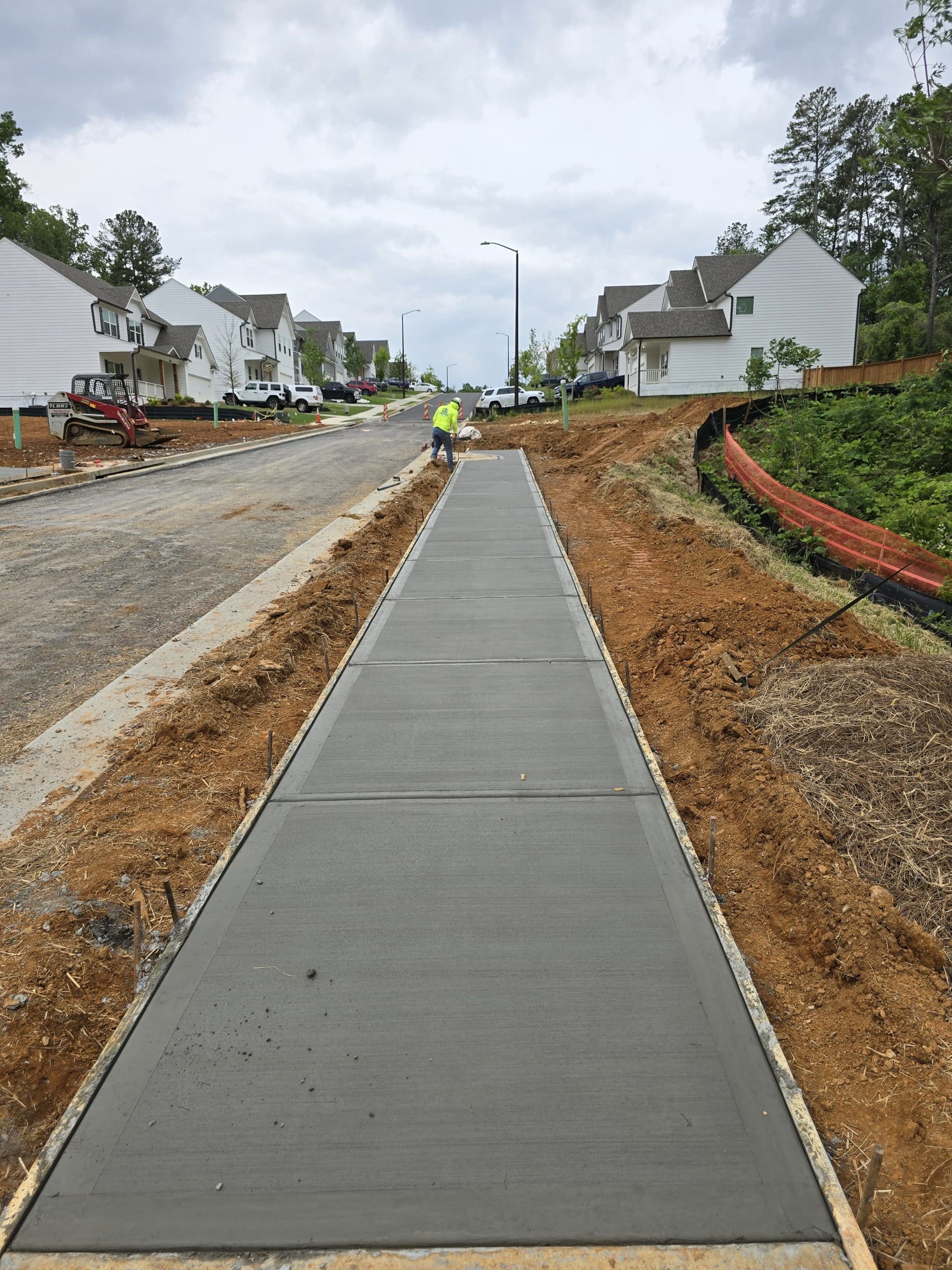 Residential concrete sidewalk installation