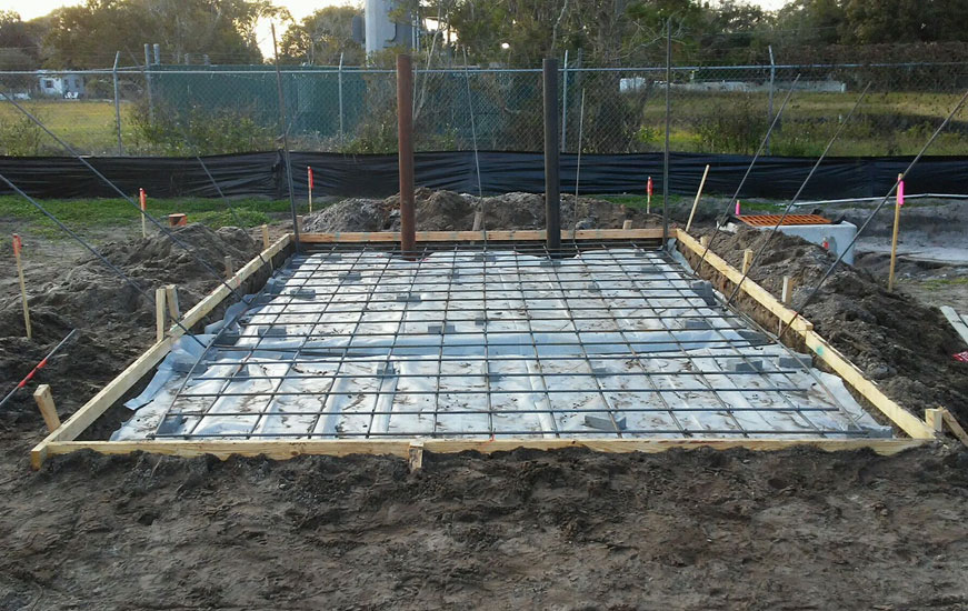 Commercial concrete dumpster pad construction